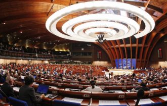 Members of the Parliamentary Assembly of the Council of Europe attend a debate in Strasbourg